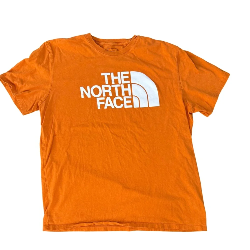 The North Face Mens XL Orange Graphic Logo T-Shirt Circular Design Short Sleeve